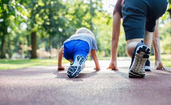 Dad and son get active on the running track