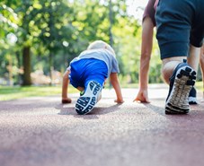 Dad and son get active on the running track