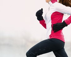 Woman running in snow