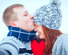 Couple kissing in the snow